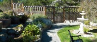 Idyllic garden with custom fence